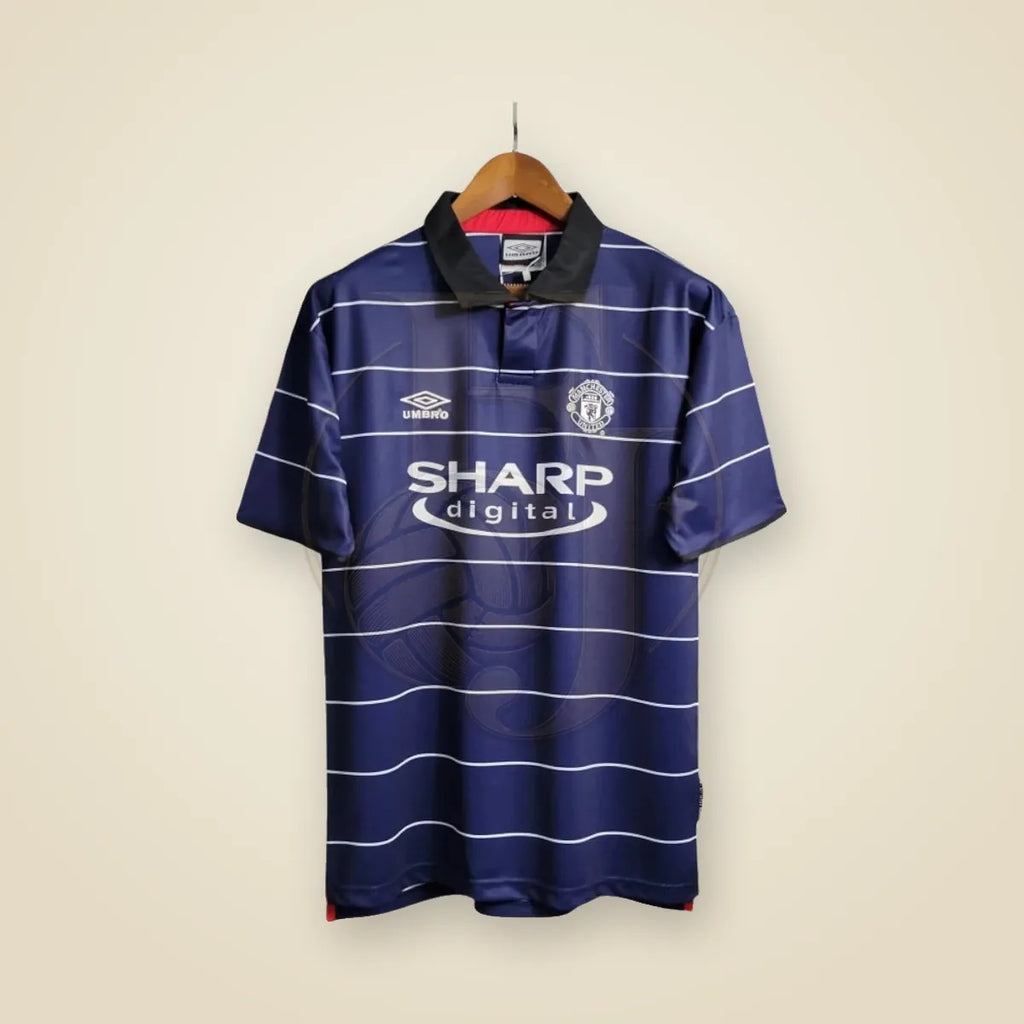 Camiseta Manchester United Retro 1999 - Fuera de Juego Club